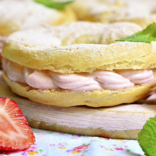 Choux pastry ring with filling from strawberry and mascarpone.